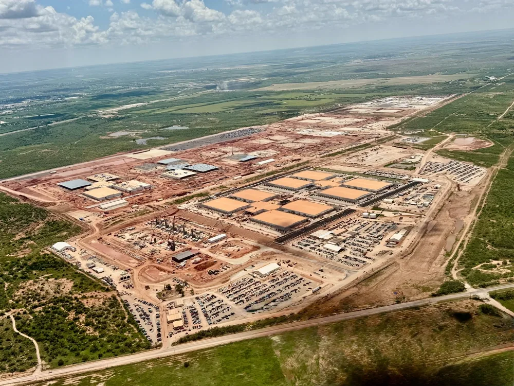 Aerial view of a large data center campus construction site in Texas.
